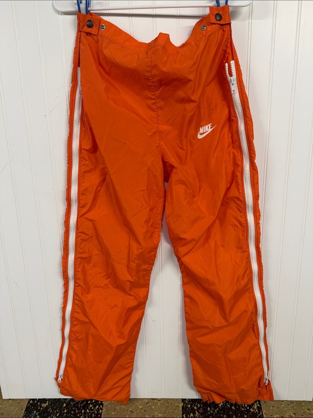 Nike Orange Track Pants with White Side Zippers